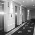 Desembarco de ascensores y pasillo de habitaciones.Cabe destacar la moqueta realizada en exclusiva para este Hotel de Lujo.